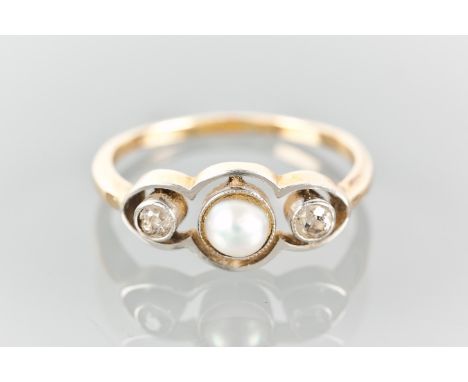 EDWARDIAN PEARL AND DIAMOND THREE STONE RING
the central pearl 4.5mm diameter flanked by two diamonds, marked 18ct for eighte