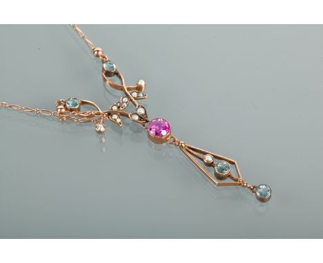 EDWARDIAN PINK ZIRCON AND AQUAMARINE NECKLET
with sinuous floral motifs to the centre of the necklet, set with round aquamari