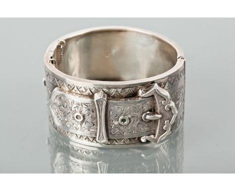 VICTORIAN SILVER BANGLE
with belt buckle motif, maker Haseler Brothers, Birmingham 1882, 30mm wide