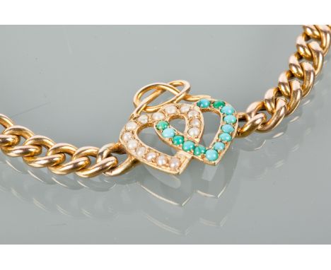 EARLY TWENTIETH CENTURY TURQUOISE AND SEED PEARL BRACELET
with a central turquoise and seed pearl set interlocking heart moti