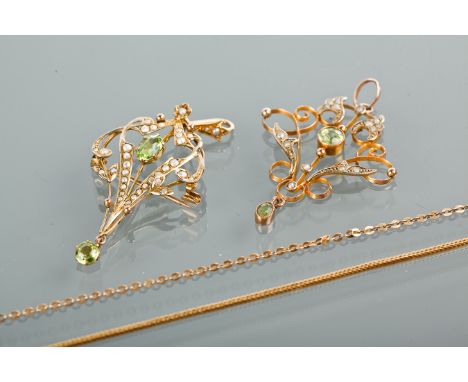 TWO ART NOUVEAU PERIDOT AND SEED PEARL PENDANTS
one a holbein, both of sinuous openwork form and set with two peridots, both 