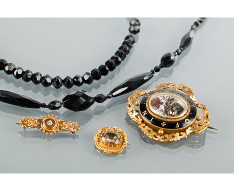 COLLECTION OF VICTORIAN JEWELLERY
comprising a mourning brooch with central hairwork section with a black enamel borders, wit