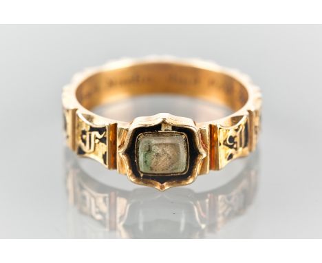 VICTORIAN ENAMELLED HAIR SET MOURNING RING
with a central section of crystal covered woven hair, the band with enamel, with i