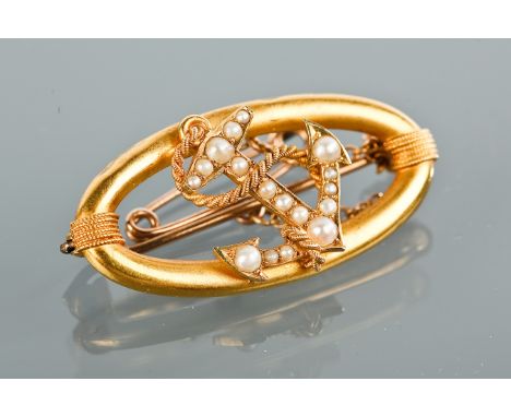 SEED PEARL SET ANCHOR BROOCH
of oval form, the anchor set with graduated seed pearls, marked 15ct for fifteen carat gold, 3.9