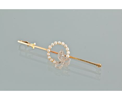 EDWARDIAN SEED PEARL AND DIAMOND SET BAR BROOCH
with a central open seed pearl set circle with a diamond set bow, on a bar 53