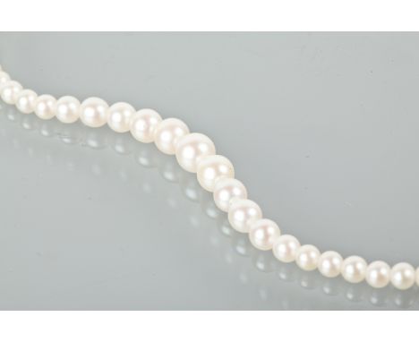 EARLY TWENTIETH CENTURY GRADUATED PEARL NECKLACE
with graduated spherical pearls, with a nine carat gold diamond set clasp, 4