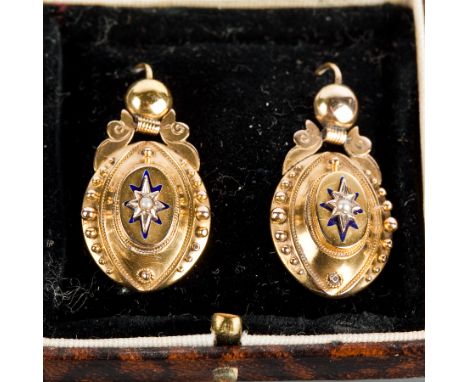 VICTORIAN ENAMEL AND PEARL DROP EARRINGS
each of oval form, with a central star set pearl, the star with enamel border, unmar