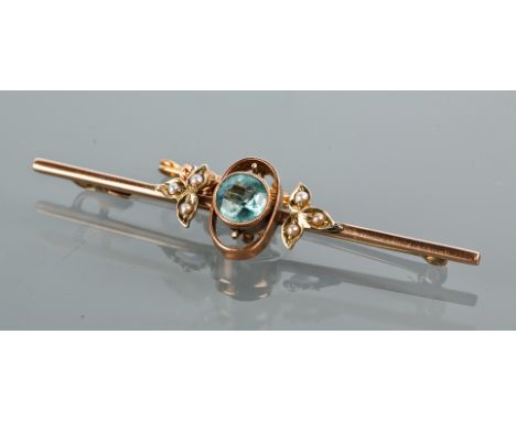 EDWARDIAN ZIRCON AND SEED PEARL BAR BROOCH
with a central circular zircon flanked by seed pearls in foliate settings, marked 