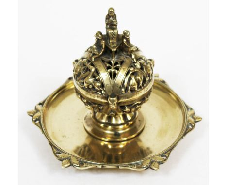 A Victorian Medieval style brass inkwell, height 19cm.  