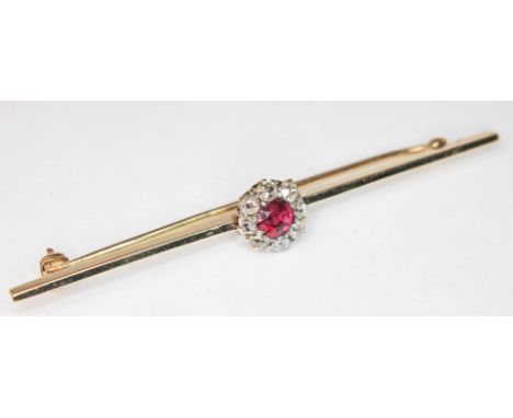 A ruby and diamond brooch, unmarked, gross weight 3.8g, length 64mm.  