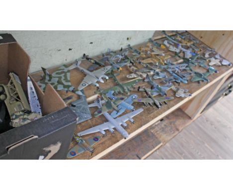 Approx. 40 model aeroplanes with stands and other military models.  