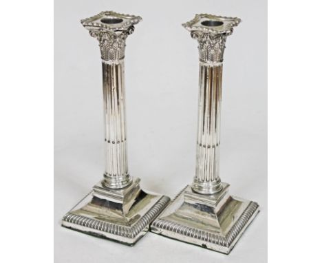 A pair of hallmarked silver Corinthian column candlesticks engraved with crest and motto of the Royal Horse Artillery, Goldsm