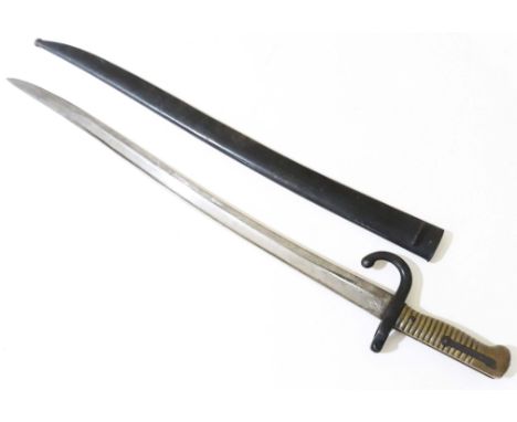 A French bayonet and scabbard, length 71cm. 