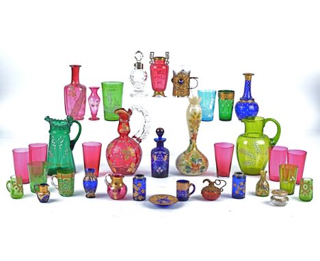 A small collection of ornate Victorian and later glass to include an enamelled green glass jug for Ramsgate,  height 18cm, a 