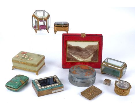 Eleven ornate go to bed caskets and trinket boxes predominantly dating to the early 20th Century,  to include a gilt example 