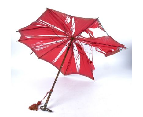 A Georgian lady's parasol, with silver topped handle modelled as a rabbit's head, London 1929, on a bamboo stick with red fab