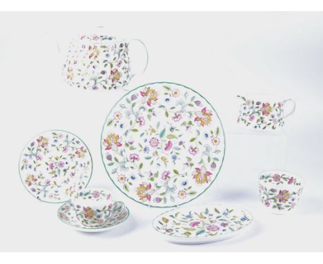 A Minton Haddon Hall pattern tea set,  consisting of eight cups, eight saucers, eight side plates, a sugar bowl and jug and c