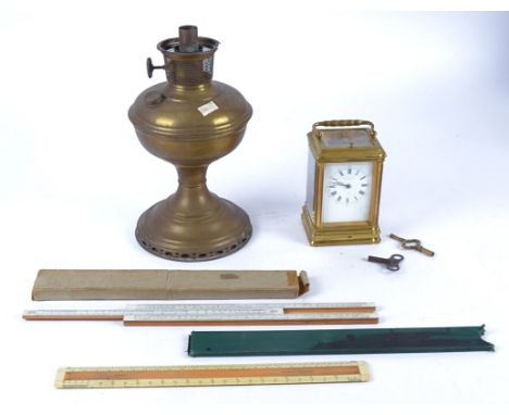 A Howell &amp; James brass carriage timepiece,  the enamel dial with Roman numerals, 17cm x 8.5cm x 7.5cm, together with an A