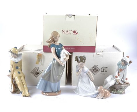 Four Nao figures, a girl holding a rabbit, a girl playing with a puppy and two clowns, all in original boxes (4)