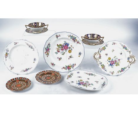 Four Minton china twin handled soup cups and saucers in the Imari taste,  together with two similar Wedgwood dishes, diameter
