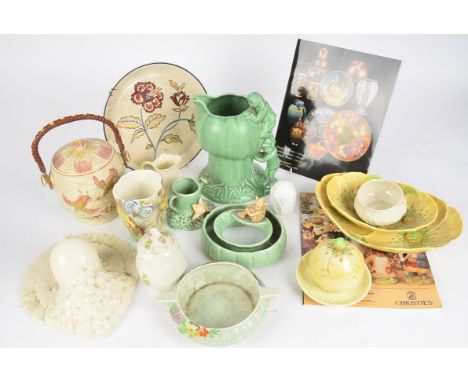 An early 20th Century Clarice Cliff part dinner service with transfer printed design, together with a twin handled moulded po