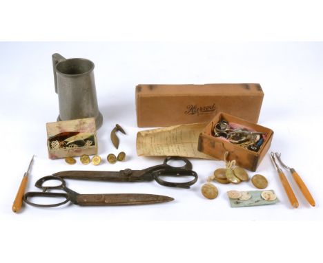 A collection of lace and sewing equipment, including scissors, thimbles, a set of seven carved mother of pearl buttons and ot