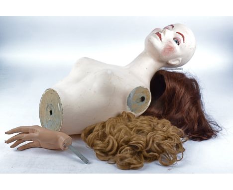 A female full length shop mannequin,  height 176cm, together with another torso, a fur coat and a quantity of wigs (parcel)