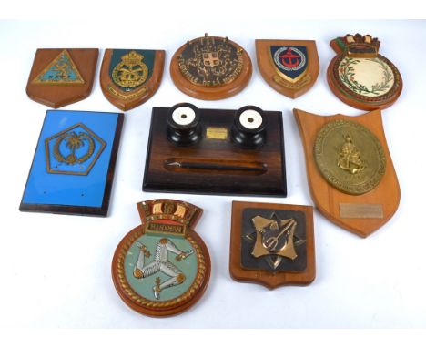 A 1920's mahogany inkwell with brass plaque stating 'Made from timber taken from H.M.S Britannia cadet training ship at Dartm