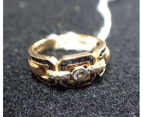 A SAPPHIRE AND DIAMOND PLAQUE RING, on an 18ct yellow gold shank, ring size N