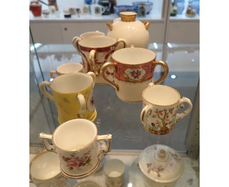 A SMALL COLLECTION OF CERAMIC CUPS (on view at Fine Art)