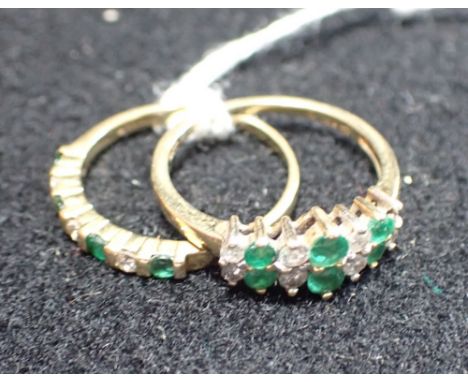 AN EMERALD AND DIAMOND CLUSTER RING, on an 18ct yellow gold shank, together with one other similar ring, both ring size O 