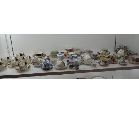 SIX COALPORT CUPS AND SAUCERS and a mixed collection of other part tea services, cups and saucers and dessert plates (on view
