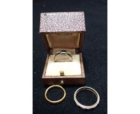 A SAPPHIRE AND DIAMOND RING, on an 18ct gold shank, together with an eternity ring and wedding band