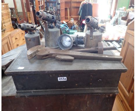 A 19TH CENTURY TOOL BOX, a wrench, carbide lamp and similar items