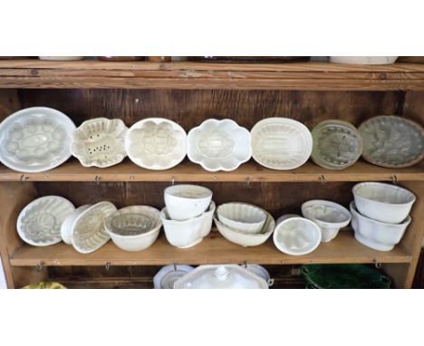 A COLLECTION OF CERAMIC JELLY MOULDS (on view at Fine Art)
