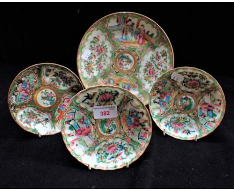 A CHINESE FAMILLE ROSE PLATE, 22cm dia and three smaller saucers, 14cm dia. (4)