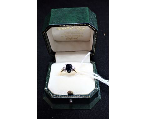 A SAPPHIRE AND DIAMOND DRESS RING, on an 18ct yellow gold shank, ring size R