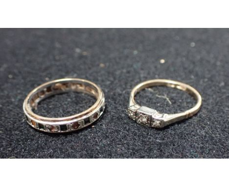 AN ILLUSION SET DIAMOND RING, on a yellow gold shank, ring size R, together with an eternity ring, ring size T (2)