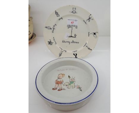 A LIMITED EDITION CERAMIC PLATE BY ASHSTEAD POTTERS from the Christopher Robin nursery set and a ceramic bowl with a scene fr
