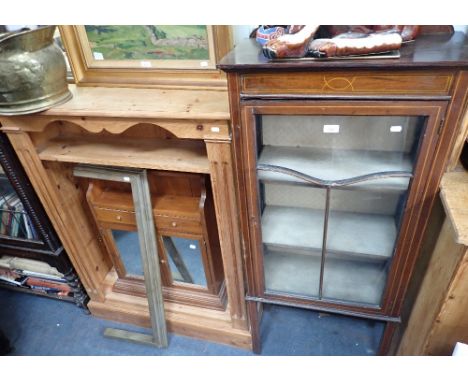 AN EDWARDIAN MAHOGANY CHINA CABINET, a pine bathroom cabinet, a brass fender and coal scuttle