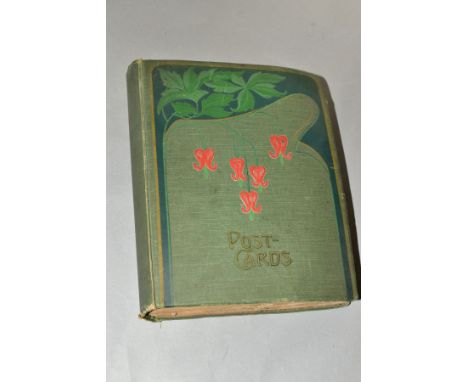 AN EDWARDIAN POSTCARD ALBUM CONTAINING APPROXIMATELY THREE HUNDRED AND THIRTY POSTCARDS from the British Isles, Europe and As
