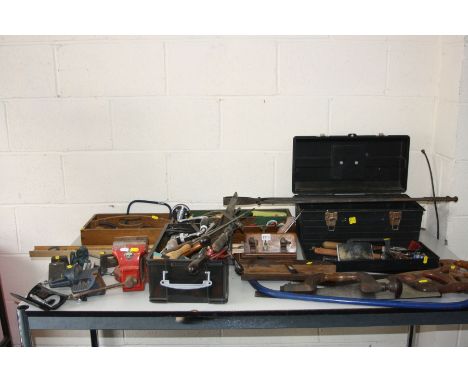 A QUANTITY OF VINTAGE HAND TOOLS including a Moore and Wright micrometer, three vices, three saws, a Plow plane, a moulding p