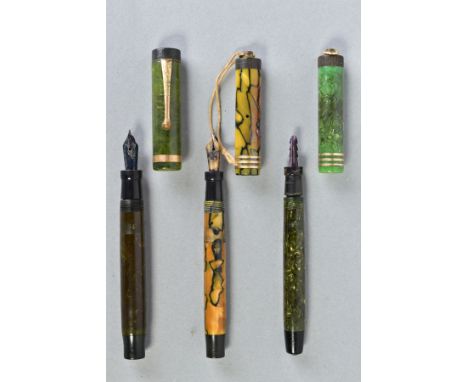 THREE VINTAGE PARKER DUOFOLD FOUNTAIN PENS consisting of a Duofold Junior in marbled green, a lighter cap with broad gold col