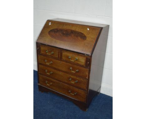 AN EDWARDIAN MAHOGANY AND BANDED BUREAU with five assorted drawers on bracket feet, width 76cm x depth 46cm x height 98cm