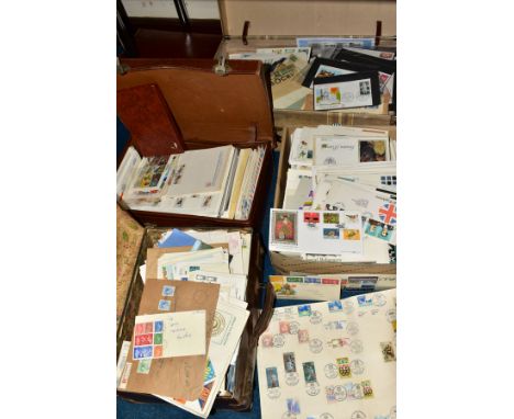 A LARGE COLLECTION OF FIRST DAY COVERS AND COMMERCIAL COVERS in three suitcases and a box, together with further suitcase of 