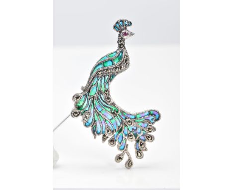 A PLIQUE-A-JOUR BROOCH, designed as a peacock with blue, green and purple plique-a-jour enamel feathers, embellished with mar