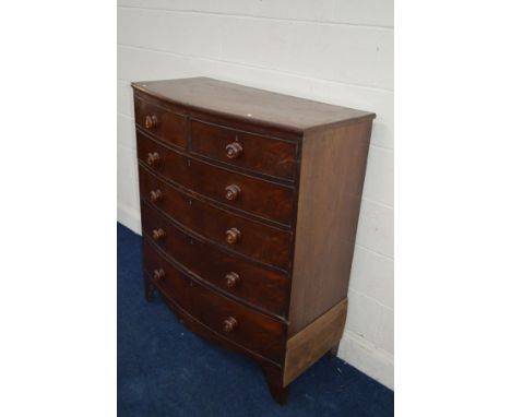 A GEORGIAN MAHOGANY BOW FRONT CHEST OF TWO SHORT AND FOUR LONG GRADUATING DRAWERS on bracket feet, width 104cm x depth 52cm x