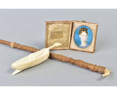 A 19TH CENTURY CONTINENTAL PORTRAIT MINIATURE OF A YOUNG LADY, indistinctly signed lower right, on ivory, mounted in a silk a