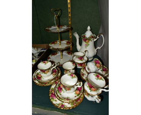 A ROYAL ALBERT OLD COUNTRY ROSES COFFEE SERVICE, comprising a three tier cake stand, coffee pot, cream jug, sugar bowl, six c