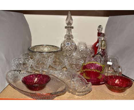 A GROUP OF GLASSWARES, to include some cranberry coloured items (sd), a cut glass decanter (stopper chipped), three cut glass